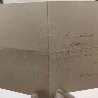 4. Invitation to the Wedding of J.B. and L.A. Davis (2/2): Invitation to "Linen and Variety Wedding of J.B. and L.A. Davis" in Willistown on May 19 1875[?]. "Royal Irish Linen Marcus Ward & Co" visible under light.