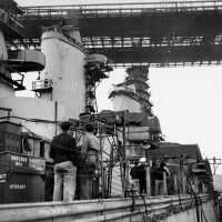 IOWA being towed under the Brooklyn Bridge at low tide with a 5 foot clearance. October 20, 1942 - 80-G-13586