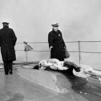 IOWA drops anchor to wait for a low tide so she may be towed under the Brooklyn Bridge. October 20, 1942 - 80-G-13568