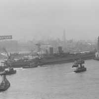 Tugs are seen arriving to move USS Iowa to her fitting out berth following her launching at the Brooklyn Navy Yard. 80-G-K-875.