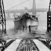USS Iowa reaches the end of her construction slipway after being launched from the Brooklyn Navy Yard. June 27, 1942.