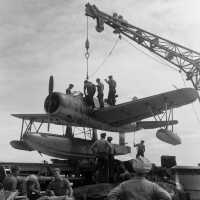 A Kingfisher being prepared to be placed on the ocean for an taxi and lift off. June 10, 1944 - BuAer 253591.