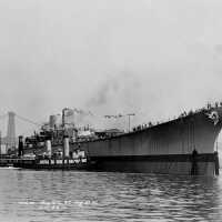 Tugs begin moving USS Iowa to her fitting out berth following her launching at the Brooklyn Navy Yard - F1111C155.