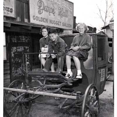 Three Children Ride a Carriage at the Pony Express Museum, CA