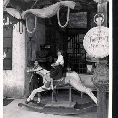 Young Child Sitting on a Rocking Horse at the Pony Express Museum, CA