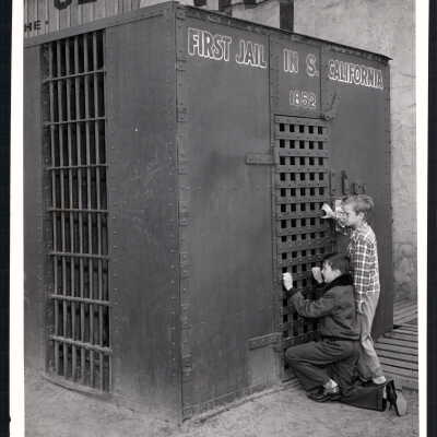 Two Boys Examine Jail Exhibit at the Pony Express Museum