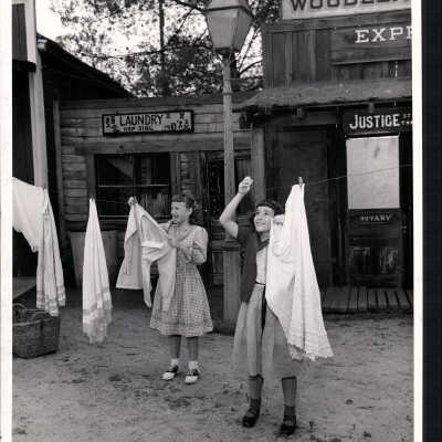 Two Girls Using the Clothes Line