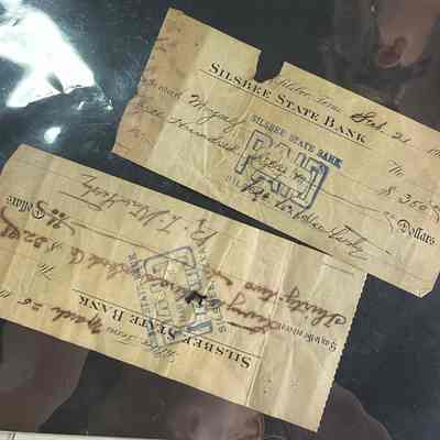 Silsbee State Bank Cancelled Checks written by R L Weathersby in 1907