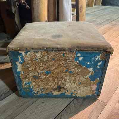 Wooden box with padded lid
