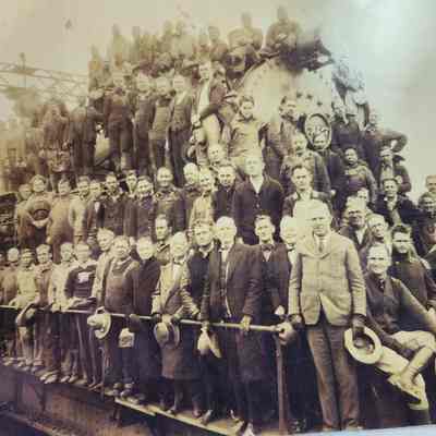 Photo of Workmen on Train Locomotive