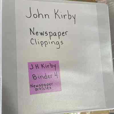 John Kirby newspaper clips