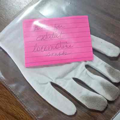 White glove with locomotive soot - new glove - exhibit supply