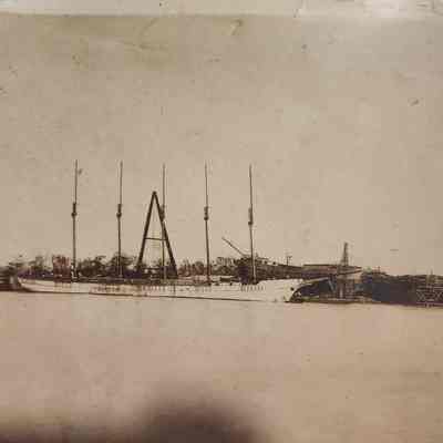 Photo of Ship at Harbor loading lumber