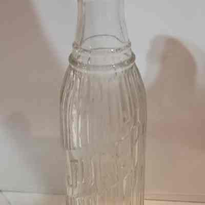 Julep branded glass bottle