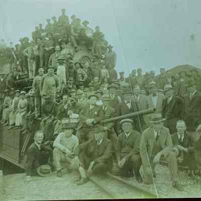 Copy of photo , men with engine and "our dog"