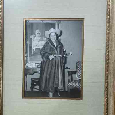Framed photo of Bess Mae Kirby holding a Colt Single action Army .45