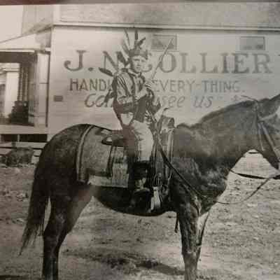 Photo of Man on a Mule outside of J N Collier Store - Copy