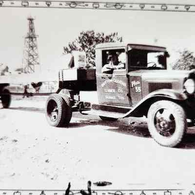 Photo of Britton Craven Lumber Co Truck carrying large beam -2 copies