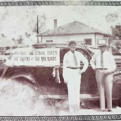Photo of Jack Hill & R Barnhill in front of car