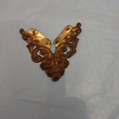 Small brass corner Bracket.