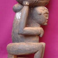 Female figure holding a container - Image 3