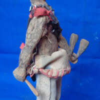 Figure of men's society member - Image 3