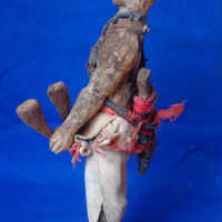 Figure of men's society member - Image 4