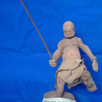 Figure of a masquerade