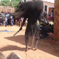 Figure of masquerade and attendants - Image 3