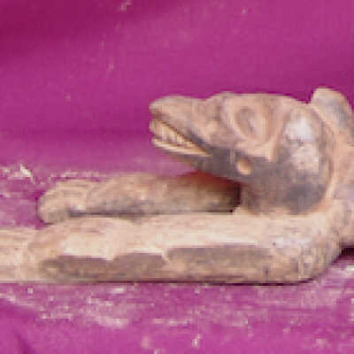 Footrest in the shape of two leopards