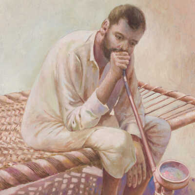 Man smoking huqqa