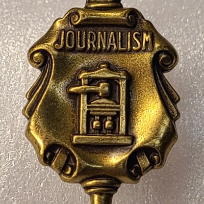 Pin, Charm, Journalism
