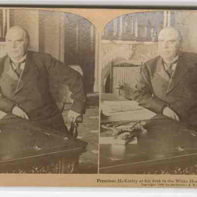 v - "President McKinley at his desk in the White House, Washington USA"