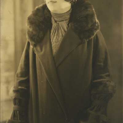 Woman Wearing Fur-trimmed Coat