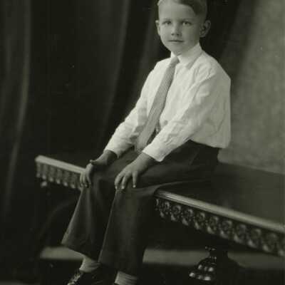 Boy Sitting on Table