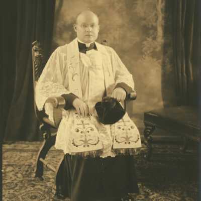 Priest Wearing Spectacles and Clergy's Frock