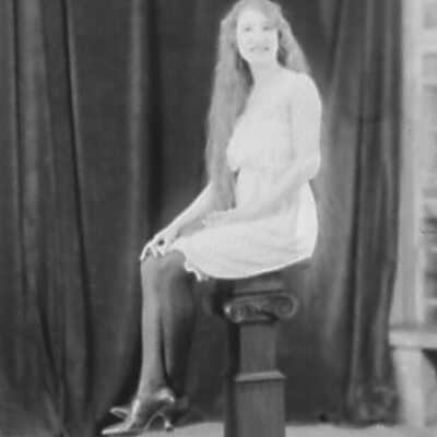 Young Woman on Pedestal