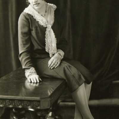 Woman Sitting on Table