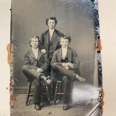 Handcolored portrait of three lads