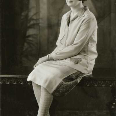 Woman Sitting on Table