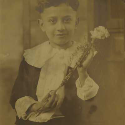 Boy Holding Flower