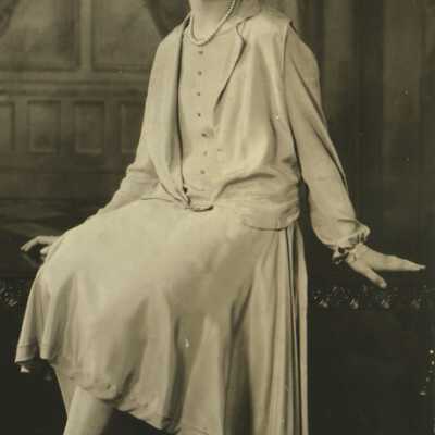 Young Woman Sitting on Table