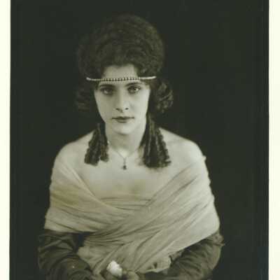Woman Wearing Headband and Curls