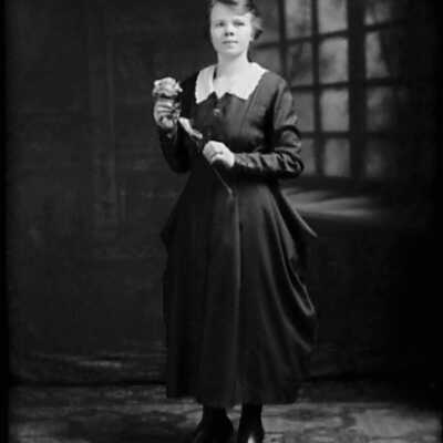 Woman Holding a Rose