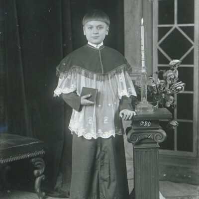 Choir Boy Holding Book