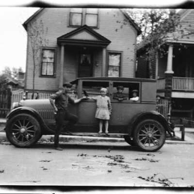 Man and Children with Automobile
