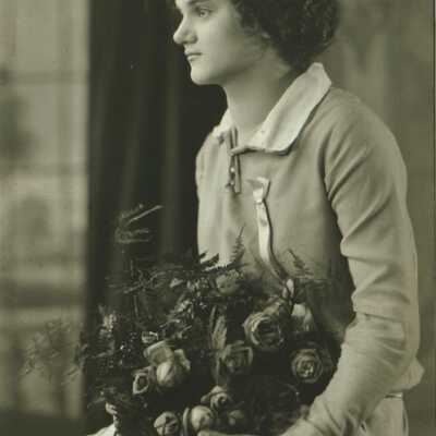 Young Lady with Bouquet of Flowers and Rolled Paper (Diploma?)