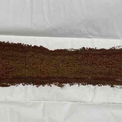Textile fragment with stylized bird motif