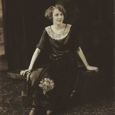 Woman Sitting on Table
