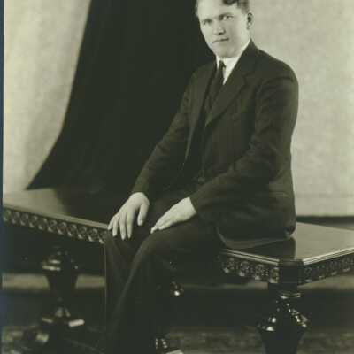 Man Sitting on Table